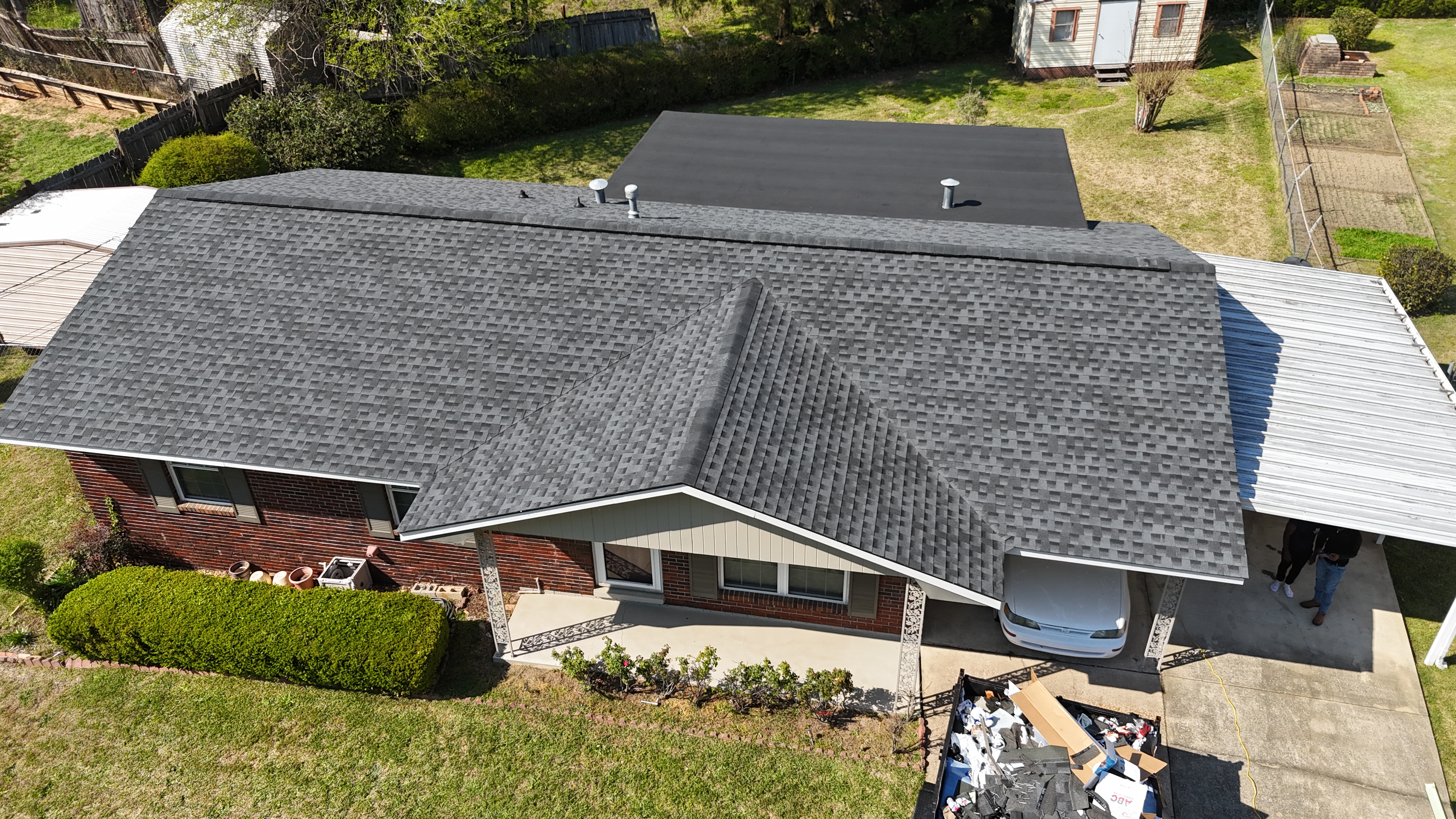 Completed shingle and flat roof