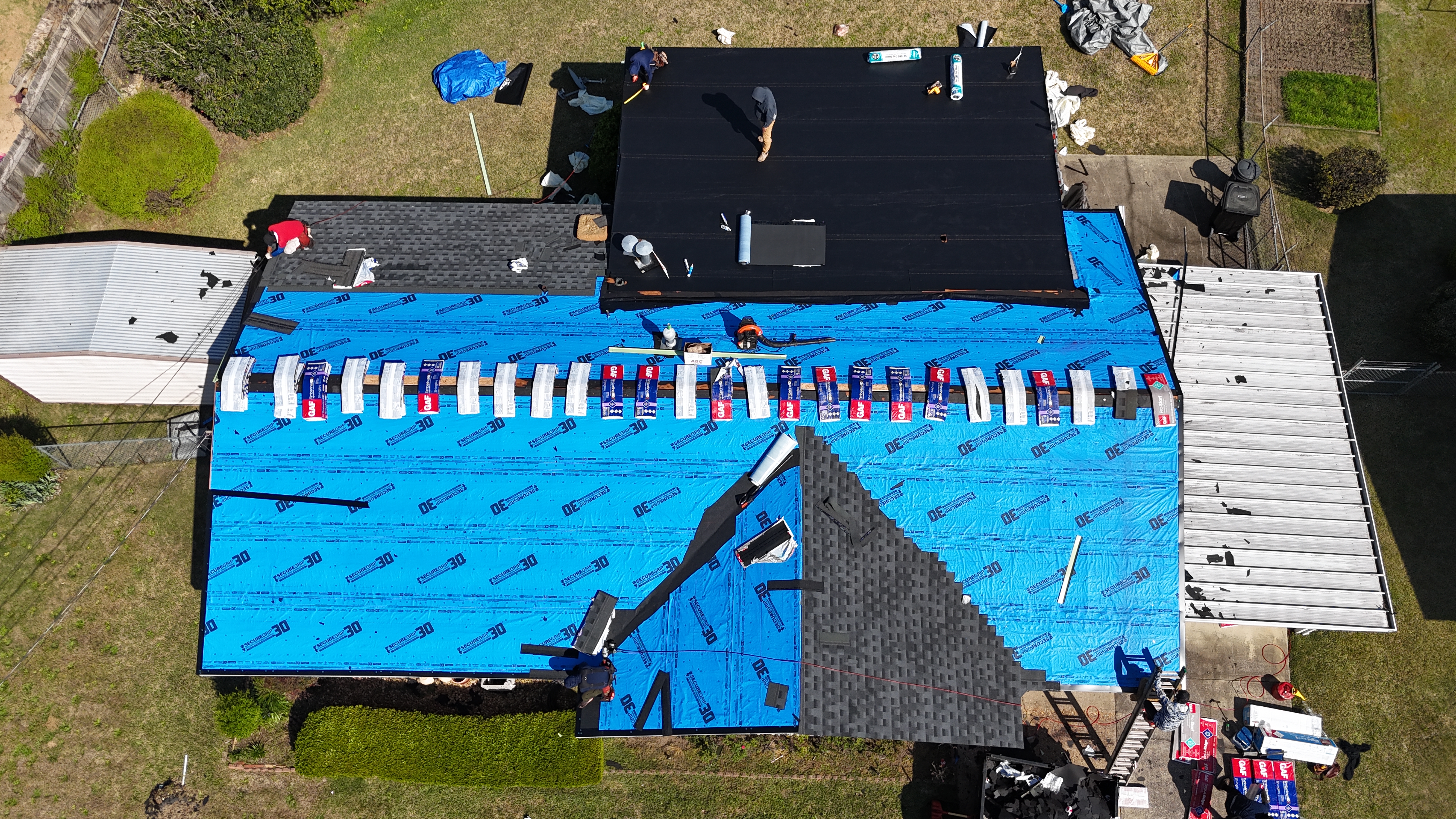 Shingle bundles laid out, installation underway