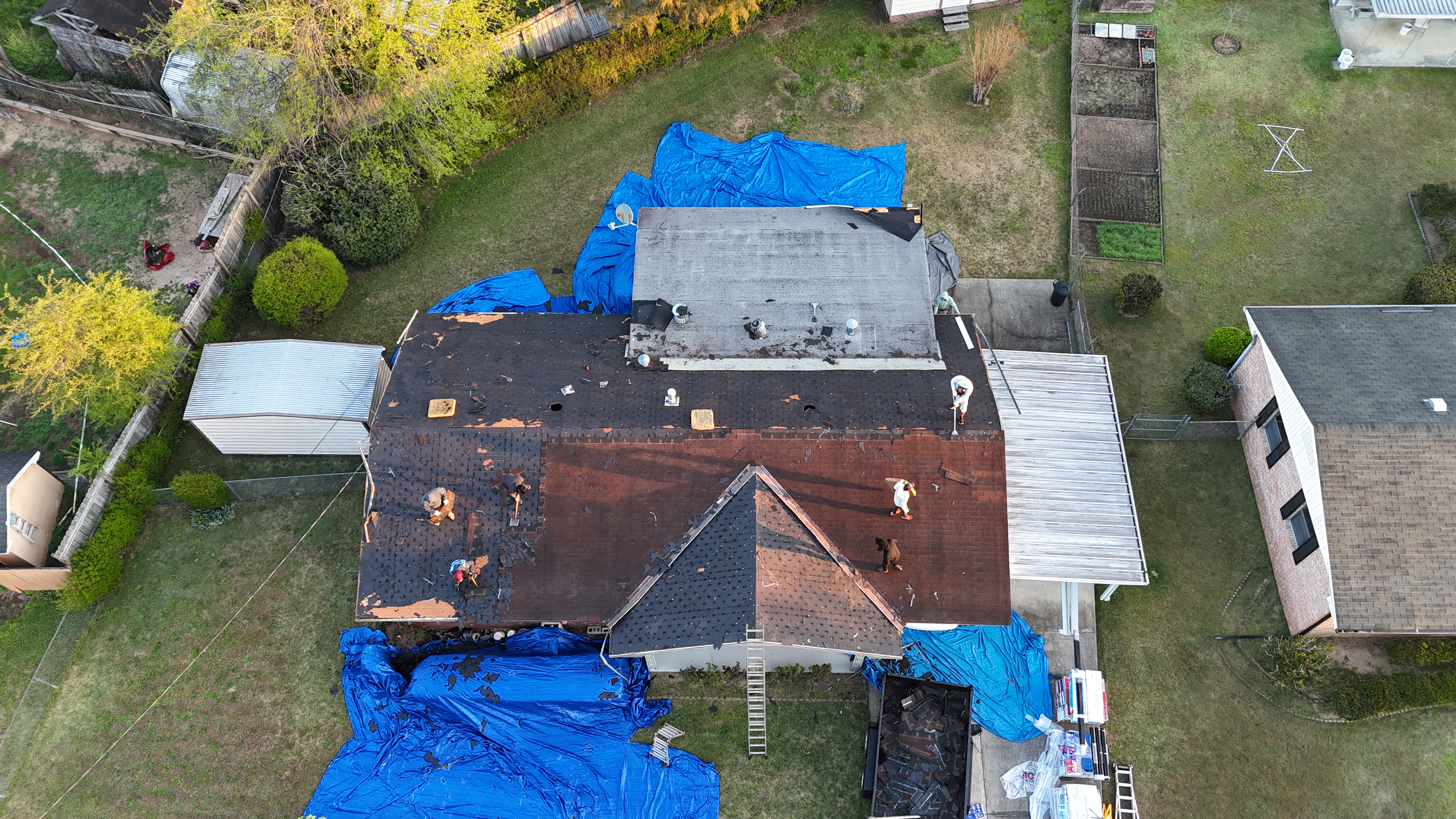 Full tear-off in progress — aerial view